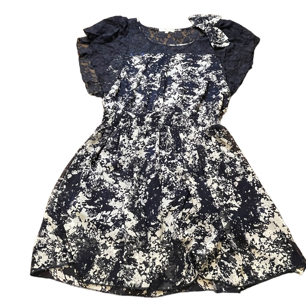 Cecico navy mini dress‎ with lace on chest area and a bow on shoulder size large